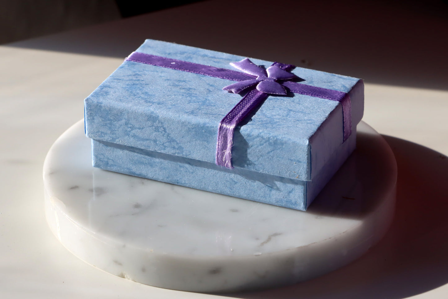 Krabička obdélníková blankytně modrá s mašličkou - Supreme Panthers